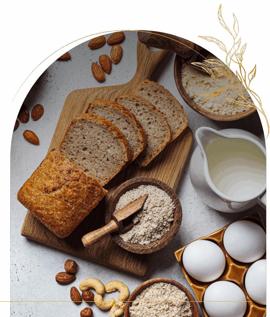 Bread and ingredients on a wooden board.